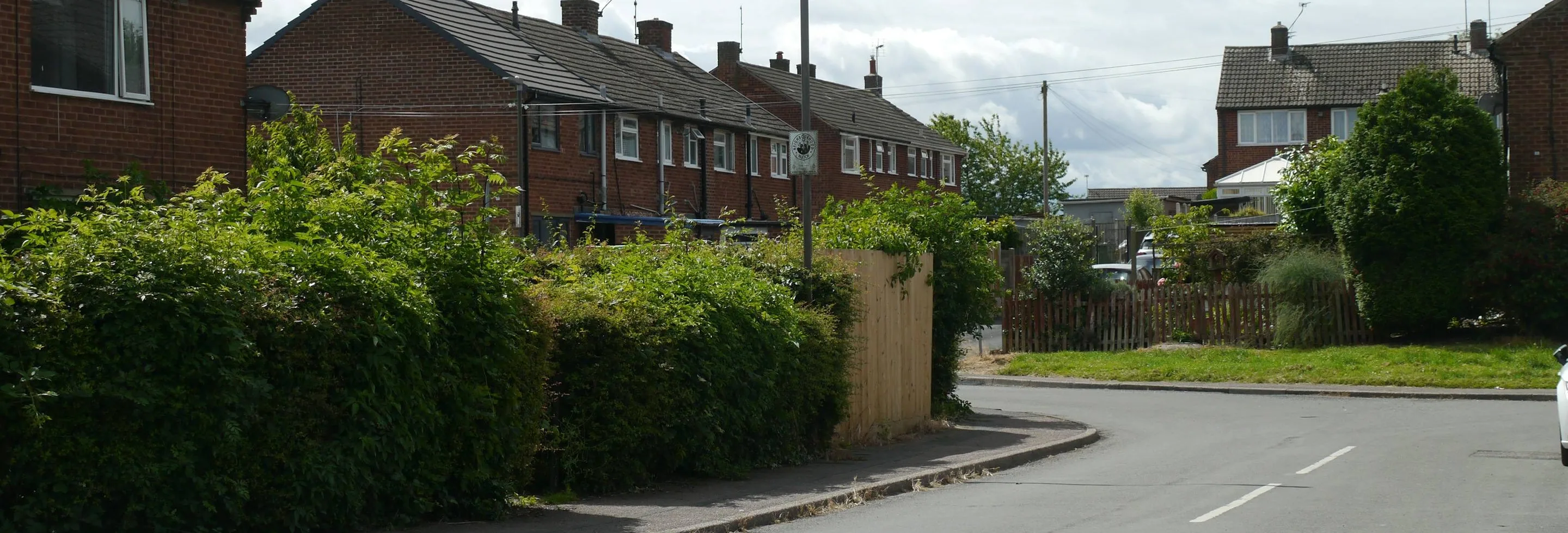 Binley — a recognisable local street or landmark, wide, subject in the middle third