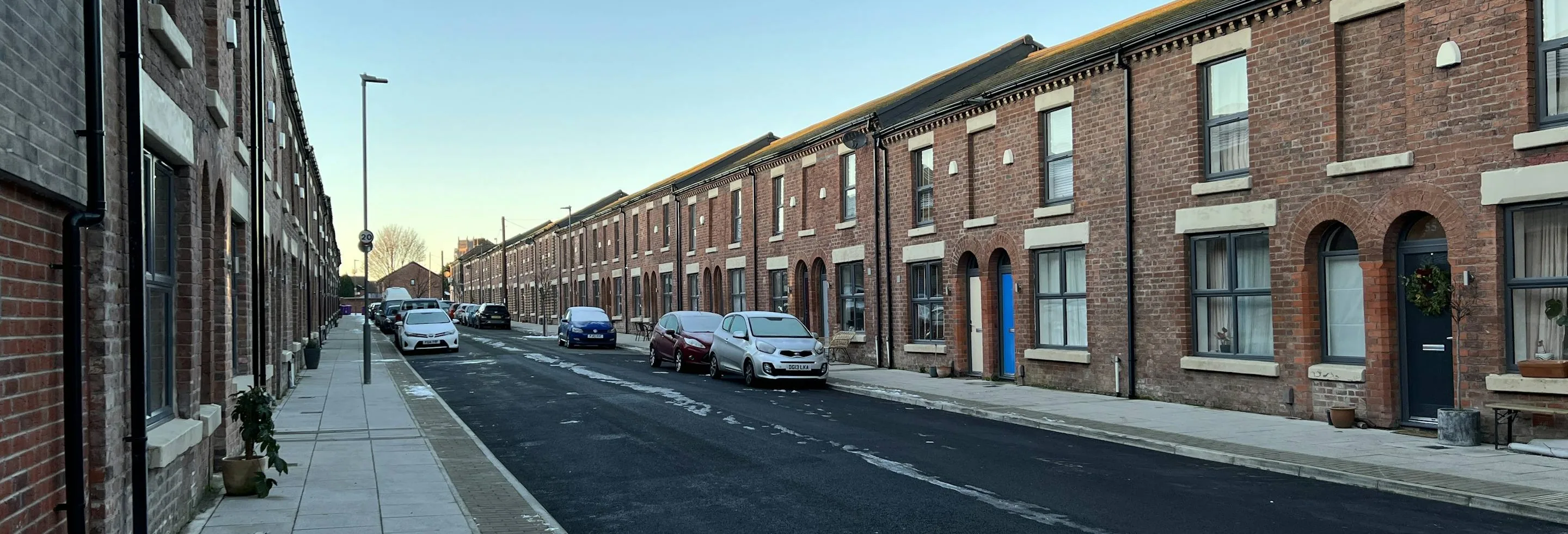 Tile Hill — a recognisable local street or landmark, wide, subject in the middle third