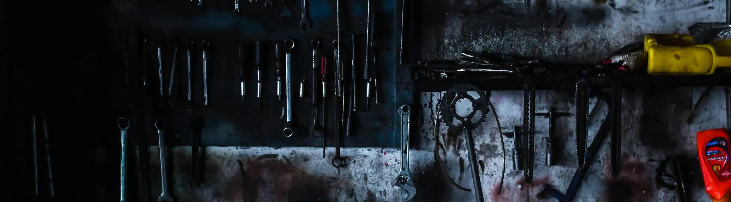 workshop tools and oils, dark, wide