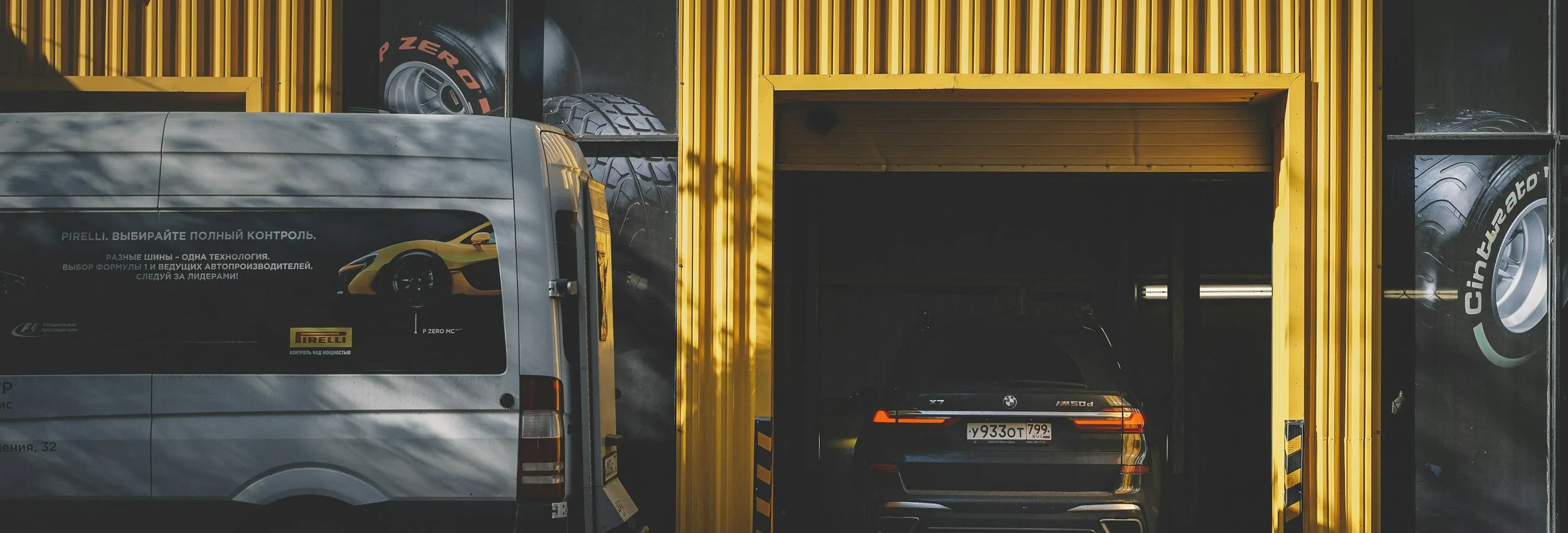 the garage entrance from the road, wide