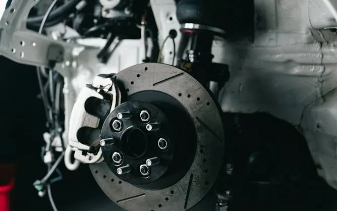 brakes and suspension — disc and calliper on the hub