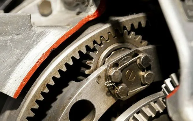 clutches and cambelts — a timing belt and gears, close